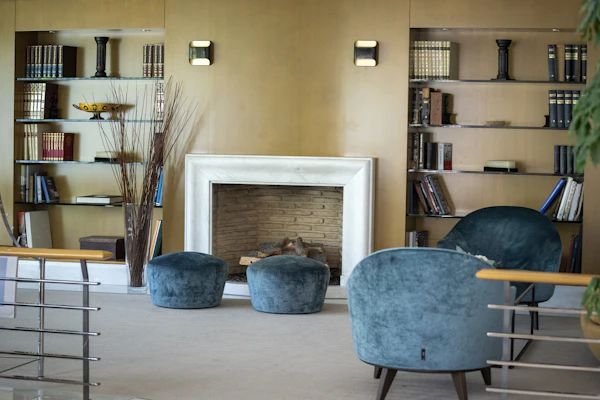 Example photo: a living room with shelving built into the alcoves either side of a fireplace
